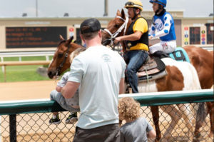 family watching races at lone star park